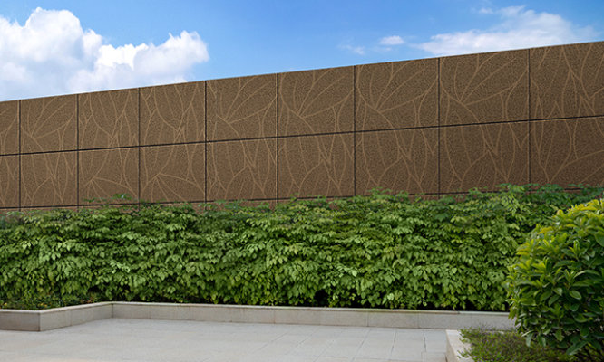 Retouched application image of an industrial courtyard featuring Sherwin-Williams Emulate Metal Leaf pattern panels in the Foliage colorway 