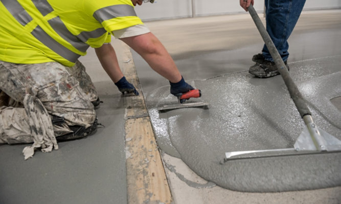 applicators applying resinous flooring materials