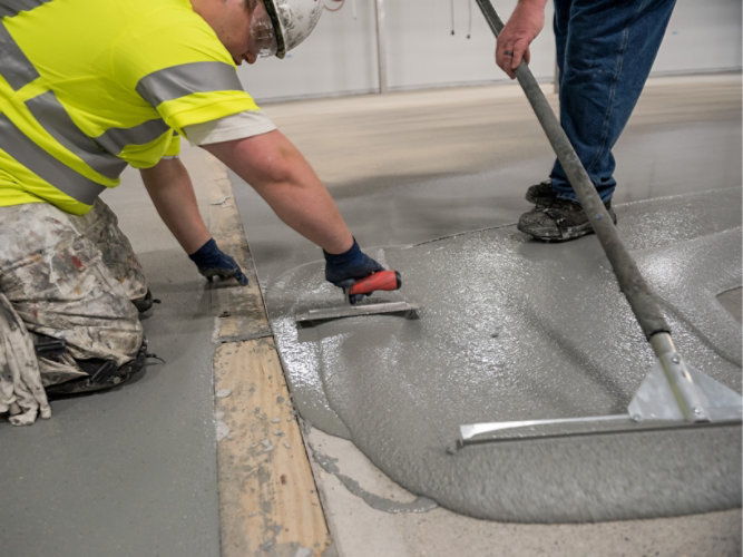 applicators applying resinous flooring materials