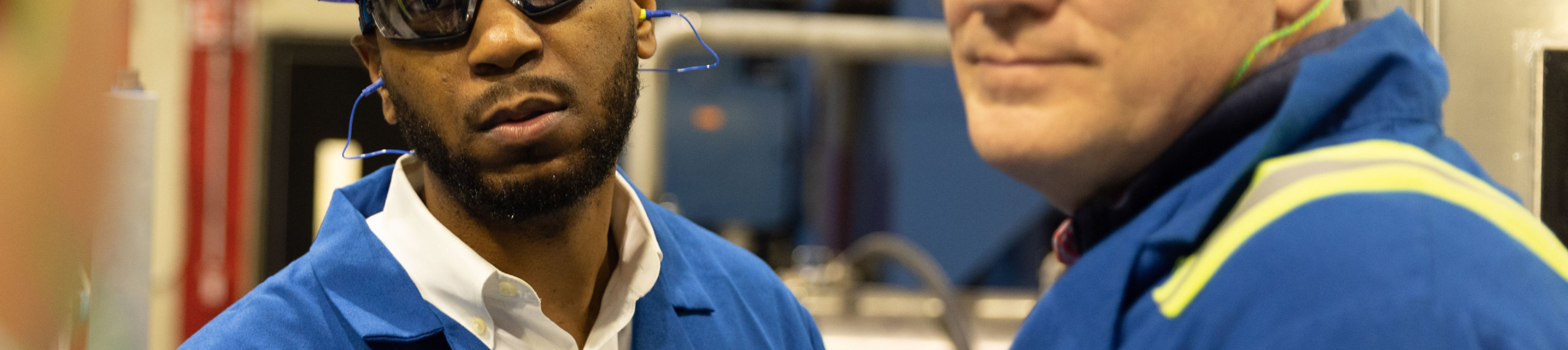 Employees touring facility