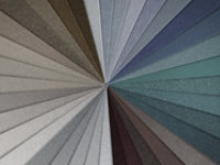 Photo of various textured metal coatings colors spread out in a fan pattern