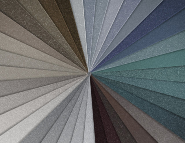 Photo of various textured metal coatings colors spread out in a fan pattern