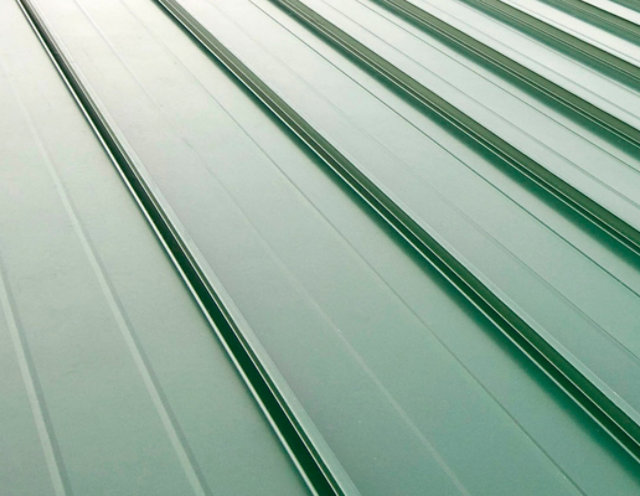 Tightly cropped image of metal roofing panel texture