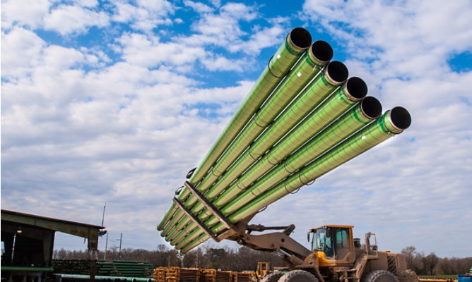 Oil and gas underground pipes being carried by forklift