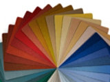 Several coatings swatches in a variety of colors fanned out 