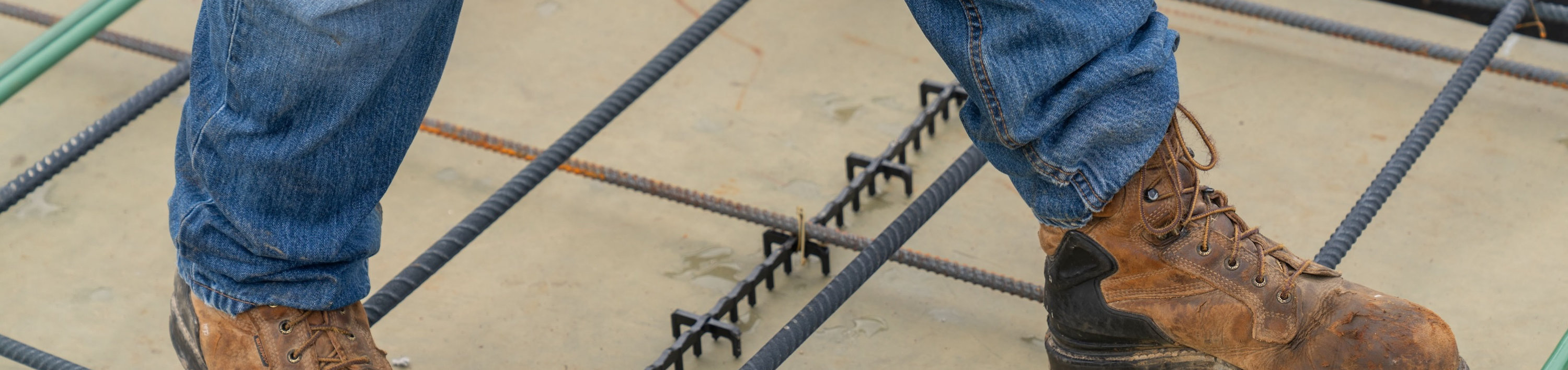 Walking on rebar coated in Sher-Bar TEC