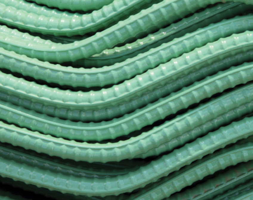 Close up of rebar coated with Sher-Bar Green