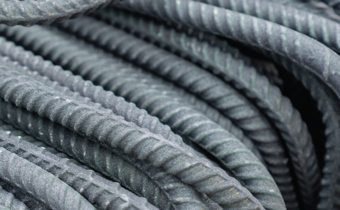 Close up of rebar coated with Sher-Bar TEC