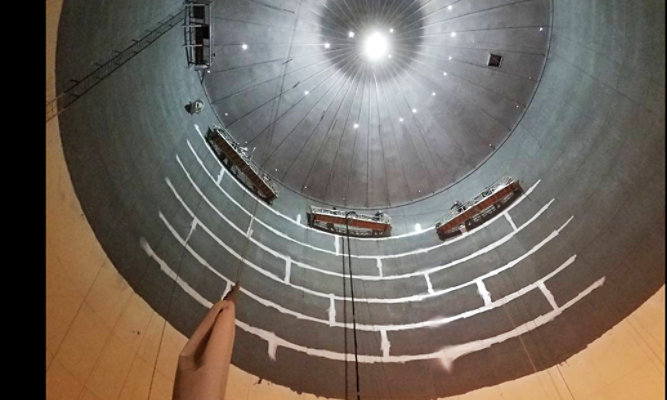 Inside water tank at Paine Field during application of SherPlate PW Epoxy