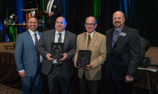 mark hudson and john palomba accepting award