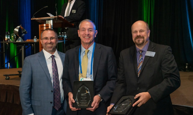 ron knecht accepting award