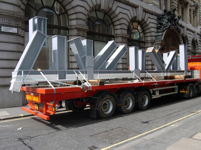 Truck Transports Steel to Site