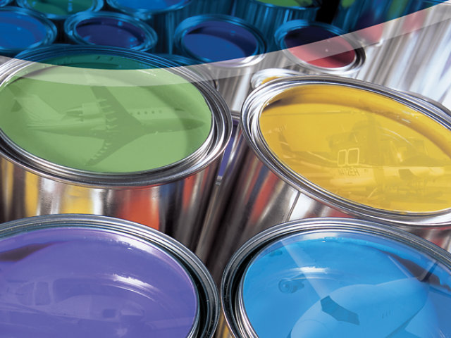 reflection of airplanes in Sherwin-Williams paint cans