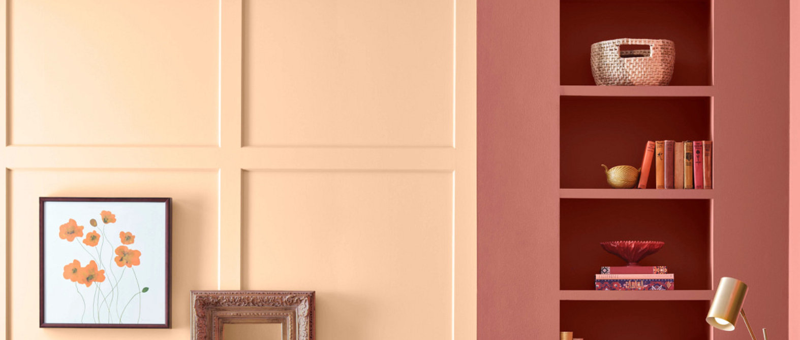 Detail view of painted wood surface showing warm brown tone and smooth sheen.