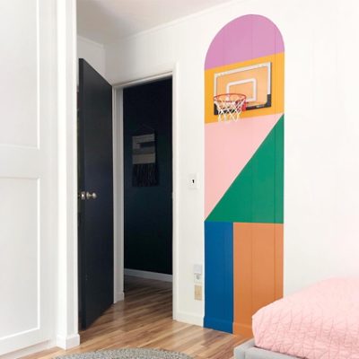 An abstract wall design with a basketball hoop.