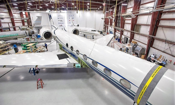 light-gray-hangar-flooring-and-airplane