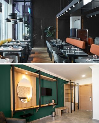 First image: Restaurant interior with herringbone wood floor, black walls and tables and chairs. Second image: Hotel room entryway with built-in wood shelving, bench and desk/vanity area and mounted TV on dark green wall with tile floor.