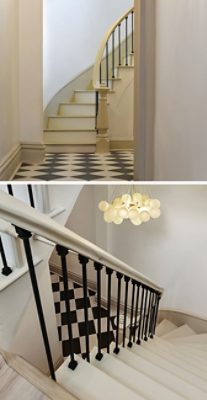 Two different angles of a spiral staircase with black railings, white steps, and a spherical light chandelier, featuring Sherwin-Williams paint in the colors Pure White and Accessible Beige.