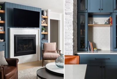 A modern living room with walls in Sherwin-Williams Drift of Mist featuring a fireplace with a mounted TV, armchair, circular coffee table, and built-ins painted Sherwin-Williams Slate Tile.