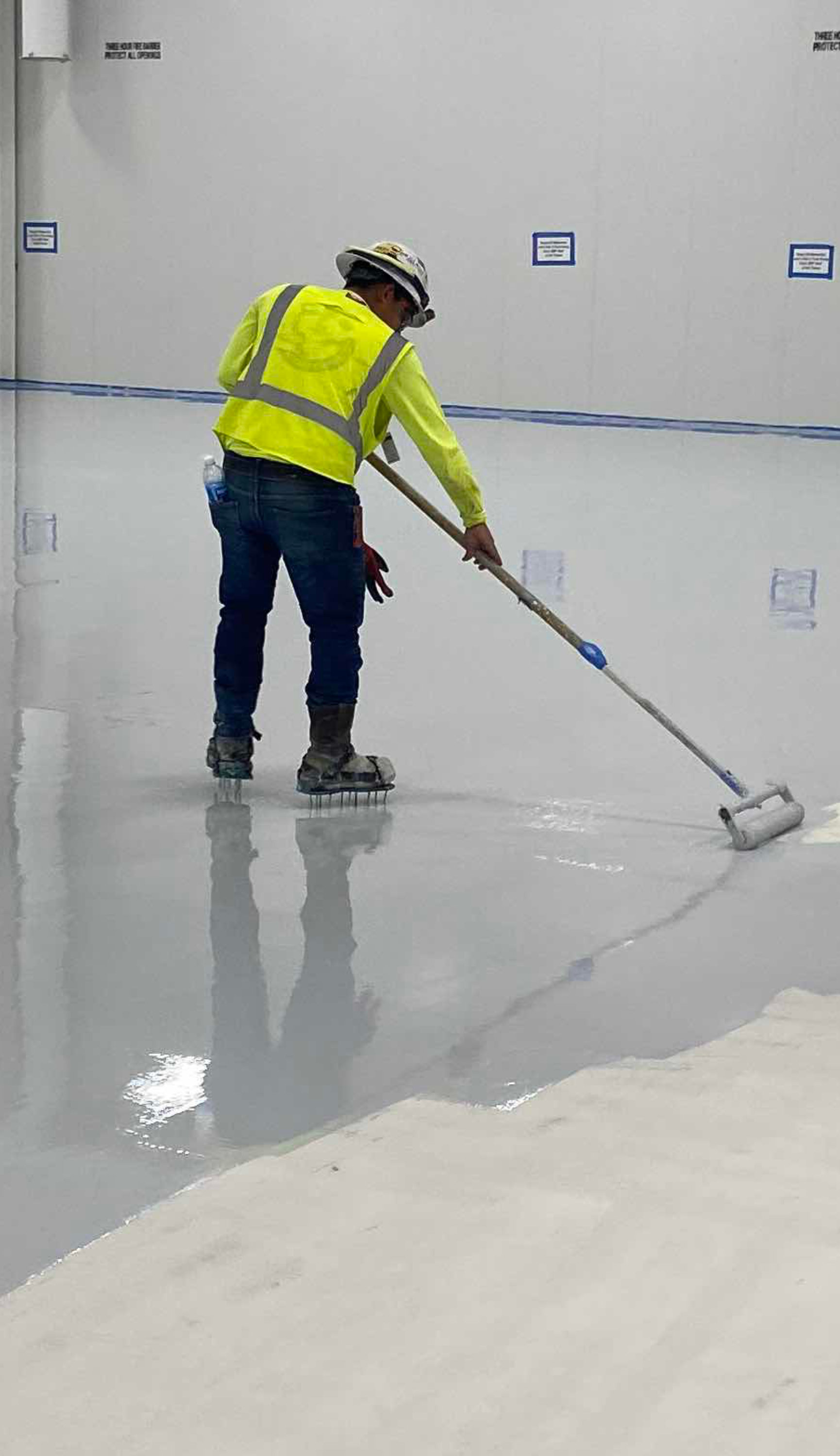resinous flooring being installed