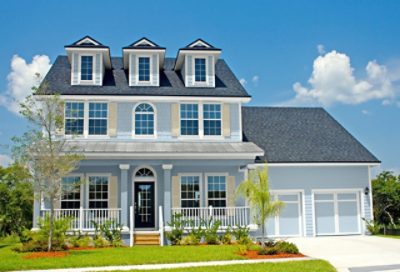 A bright blue beach house with ivory trim. S-W colors featured: SW 7601, SW 7006, SW 6413