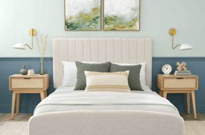 Two toned bedroom painted in SW 0068 Copen Blue with neutral decor.
