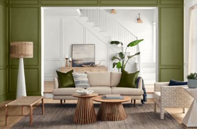Sitting room painted in SW 6426 Basque Green.