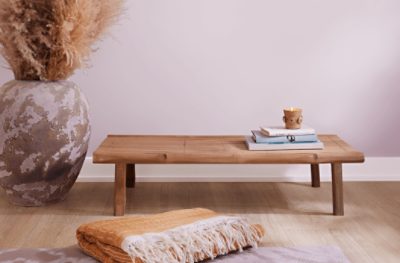 In home yoga studio with a yoga mat and bench painted Wallflower SW 6281.