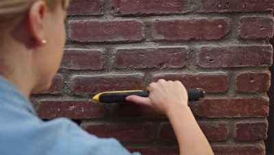 A clean, unpainted brick porch