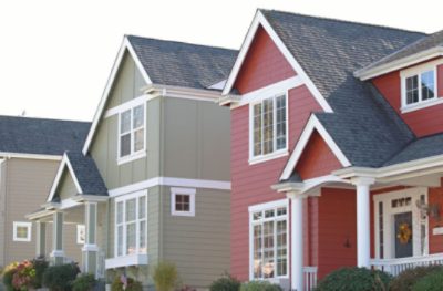 A red house and a green house.