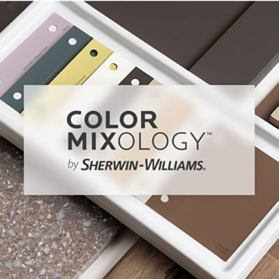 A tray of paint color swatches featuring various shades of brown, yellow, and gray. A semi-transparent overlay in the center reads 'COLOR MIXOLOGY™ by SHERWIN-WILLIAMS®.'