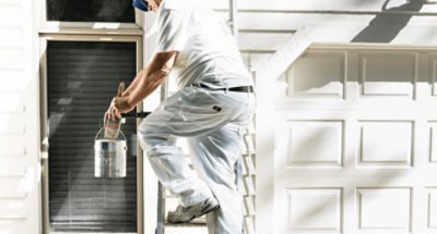 A painter on a ladder.