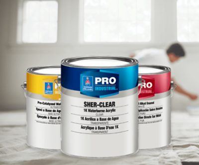 Three cans of Pro Industrial paint.