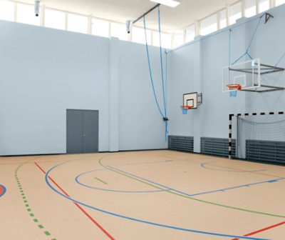 A basketball court with doors, trim and other accents painted Outerspace SW6251.