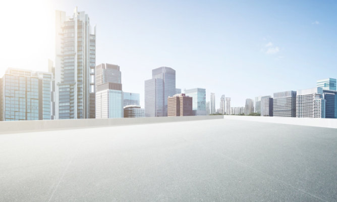 Empty car park and skyscraper