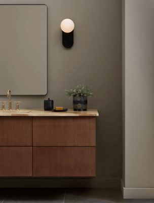 Bathroom walls painted in SW 9172 Studio Clay, wooden vanity with gold hardware.