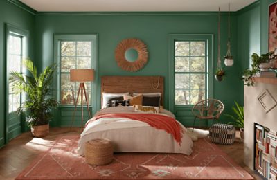 A bedroom painted Kale Green.