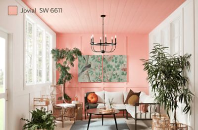 Bright sitting room with an accent wall and ceiling painted in SW 6611 Jovial.