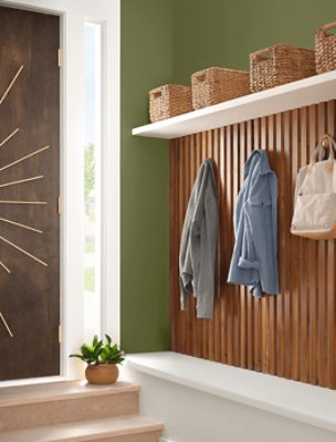Mudroom painted in SW 6426 Basque Green.