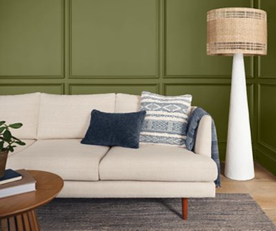 Living room painted in SW 6426 Basque Green.