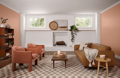 A living room with two opposite walls painted Rose Tan.