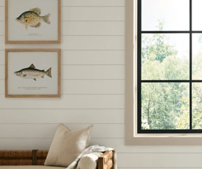 Bright wall with window, fish prints, painted in SW 9173 Shiitake.