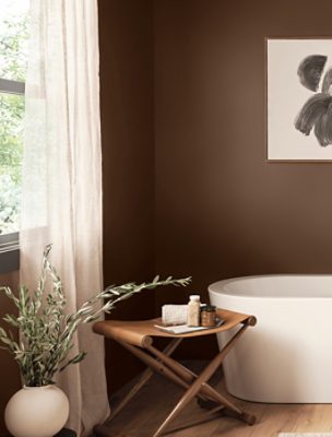 Bathroom with a free-standing tub painted in SW 6090 Java.