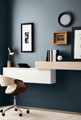 Office painted Sherwin-Williams Rain Cloud SW9639 with a two-tier desk colored light brown and white.