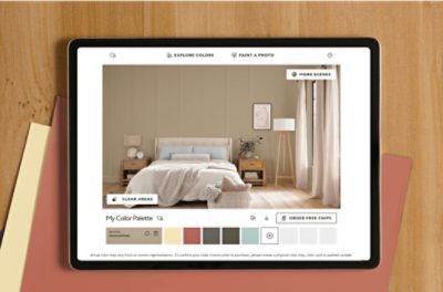 A tablet with the Sherwin-Williams Color Visualizer tool on screen.