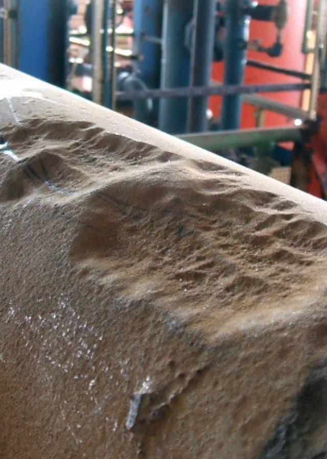 Image of an insulated pipe with rust formation