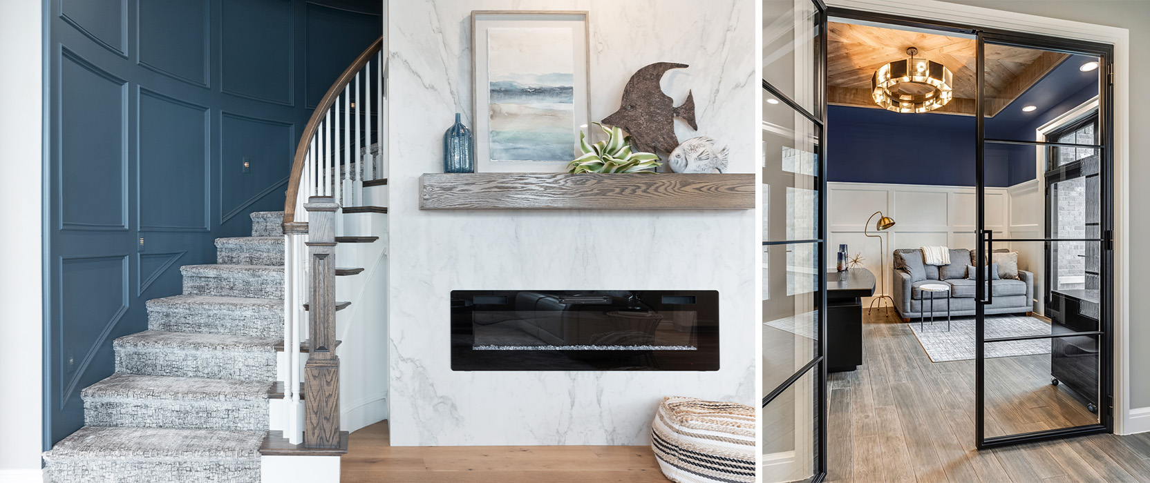 Left image: Carpeted stairwell with blue millwork wall curving around a modern electric fireplace topped by coastal-inspired decor on mantel. Right image: Modern glass French doors with black panes looking into living room with gray couch, white painted molding and navy blue walls.