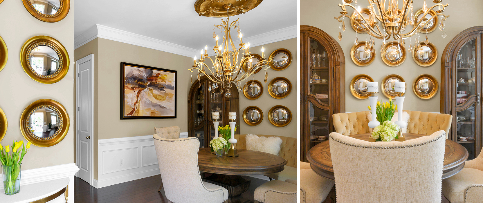 Opulent but cozy dining room with round table and tufted upholstered chairs, gold-framed mirror plate wall decor, neutral walls with white wainscoting, and gold chandelier.
