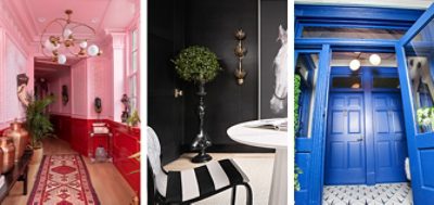 Left image: Interior hallway with pink walls and red wainscoting, crown molding, woven runner and eclectic globe chandelier. Center image: Corner of black painted room with greenery, large art print of black and white horse photo, with white table and black and white striped chair in foreground. Right image: Bold blue painted wood entry doors with transom, tile flooring, and ornamental greenery on either side.