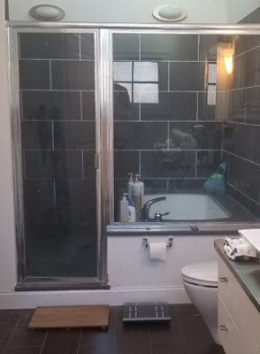 Image of two bathrooms before a transformative remodel.